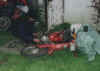 Phil fixing his new toy .jpg (72283 bytes)
